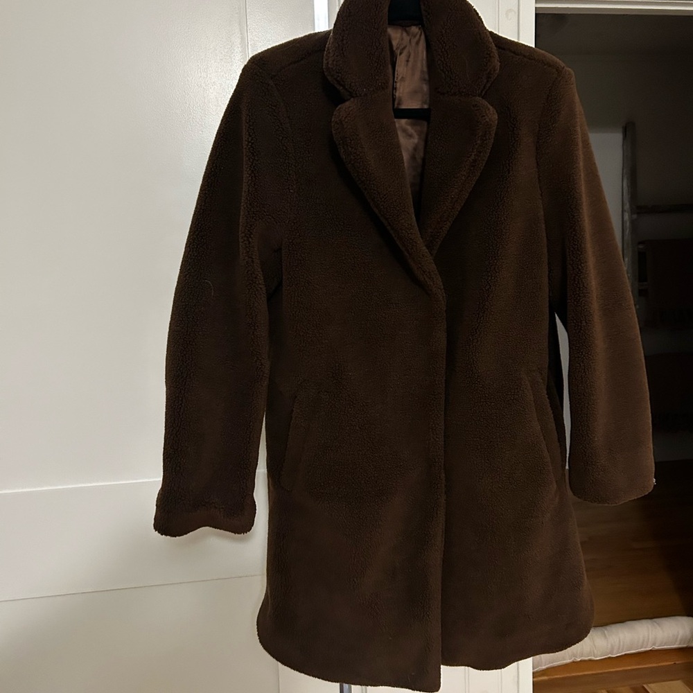 Chocolate brown faux fur coat. Knee length. Pockets. Cozy.